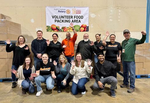 Volunteers at food packing event