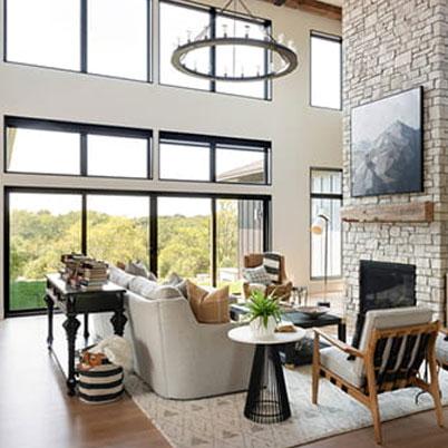 interior of home showing the great room with andersen black windows