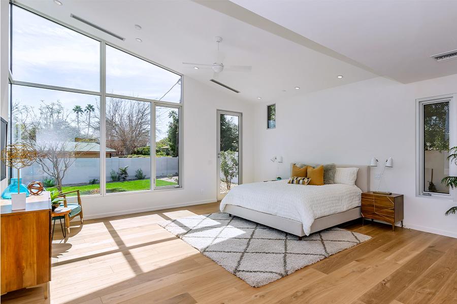 Bedroom with Andersen Aluminum casement windows in white