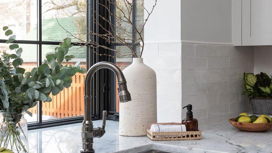 kitchen interior view with andersen black grid framed garden window