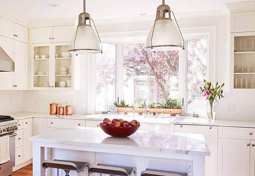 White kitchen with white garden window