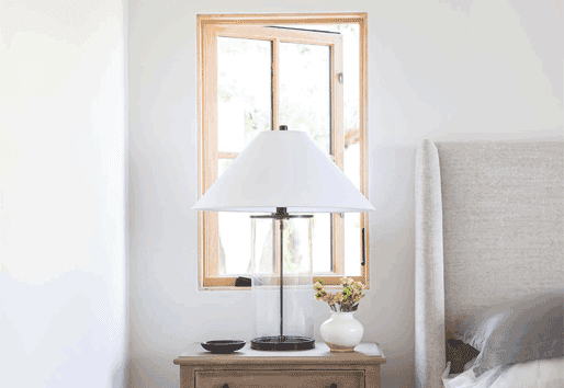 natural wood toned open bedroom window