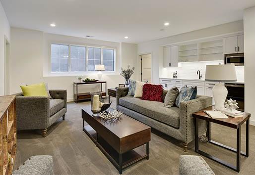 White finished basement windows cozy living space