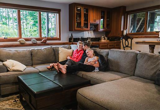 finished family room basement with wood windows