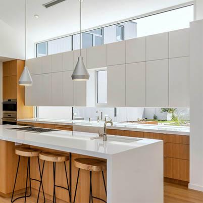 Modern White and Wood Kitchen with Window as Backsplash Heritage Windows