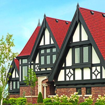 exterior view of tudor home with red roof