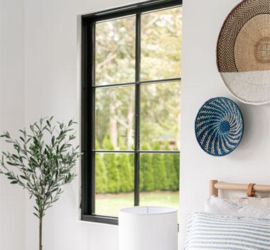 andersen e-series black framed window in bedroom